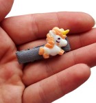 Spineczka ze śpiącym jednorożcem