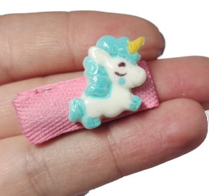 Spineczka ze śpiącym jednorożcem